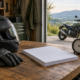 Work records and motorcycle gear represent proof of lost wages after a Rogers motorcycle crash